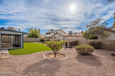 This charming Dobson Ranch home is freshly painted throughout on Dobson Ranch Municipal Golf Course in Arizona - for sale on GolfHomes.com, golf home, golf lot