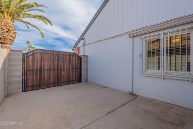 This charming Dobson Ranch home is freshly painted throughout on Dobson Ranch Municipal Golf Course in Arizona - for sale on GolfHomes.com, golf home, golf lot