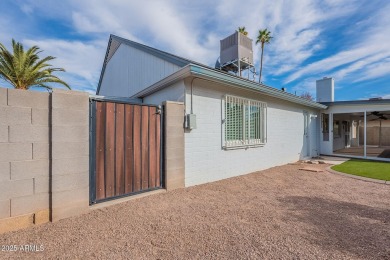 This charming Dobson Ranch home is freshly painted throughout on Dobson Ranch Municipal Golf Course in Arizona - for sale on GolfHomes.com, golf home, golf lot