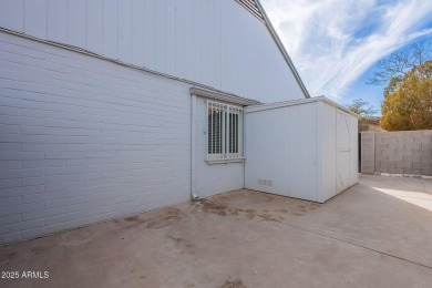 This charming Dobson Ranch home is freshly painted throughout on Dobson Ranch Municipal Golf Course in Arizona - for sale on GolfHomes.com, golf home, golf lot