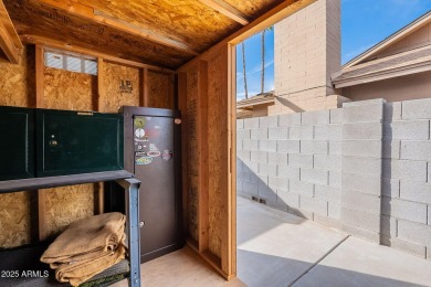 This charming Dobson Ranch home is freshly painted throughout on Dobson Ranch Municipal Golf Course in Arizona - for sale on GolfHomes.com, golf home, golf lot