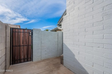 This charming Dobson Ranch home is freshly painted throughout on Dobson Ranch Municipal Golf Course in Arizona - for sale on GolfHomes.com, golf home, golf lot