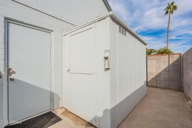 This charming Dobson Ranch home is freshly painted throughout on Dobson Ranch Municipal Golf Course in Arizona - for sale on GolfHomes.com, golf home, golf lot