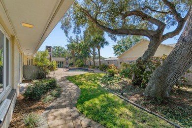 From the moment you step inside this fully renovated designer on Indian Bayou Golf and Country Club in Florida - for sale on GolfHomes.com, golf home, golf lot