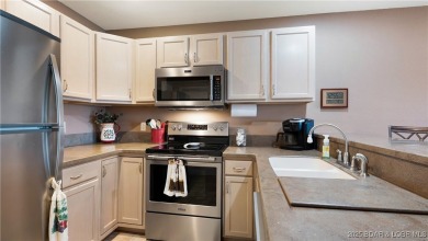 PRIDE OF OWNERSHIP is apparent upon entering this 2-bedroom 2 on Lake Valley Country Club in Missouri - for sale on GolfHomes.com, golf home, golf lot