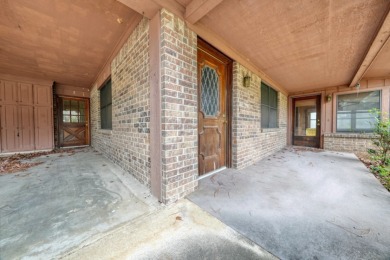 Exceptional opportunity to acquire a handyman special property! S on Hide-A-Way Lake Golf Course in Texas - for sale on GolfHomes.com, golf home, golf lot