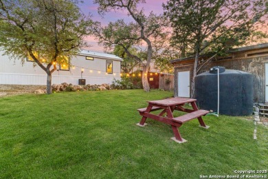 This charming 2-bedroom home in Spring Branch offers peaceful on Rebecca Creek Golf Club in Texas - for sale on GolfHomes.com, golf home, golf lot