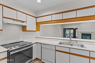 Welcome home 6128 Inland Greens Drive in nestled in the amenity on Inland Greens Golf Course in North Carolina - for sale on GolfHomes.com, golf home, golf lot