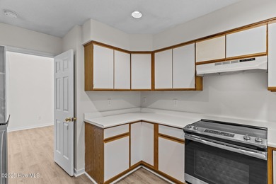 Welcome home 6128 Inland Greens Drive in nestled in the amenity on Inland Greens Golf Course in North Carolina - for sale on GolfHomes.com, golf home, golf lot