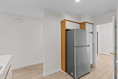 Welcome home 6128 Inland Greens Drive in nestled in the amenity on Inland Greens Golf Course in North Carolina - for sale on GolfHomes.com, golf home, golf lot