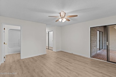 Welcome home 6128 Inland Greens Drive in nestled in the amenity on Inland Greens Golf Course in North Carolina - for sale on GolfHomes.com, golf home, golf lot