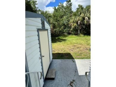 Located in an exclusive gated community with a championship on The Great Outdoors Golf and Country Club in Florida - for sale on GolfHomes.com, golf home, golf lot