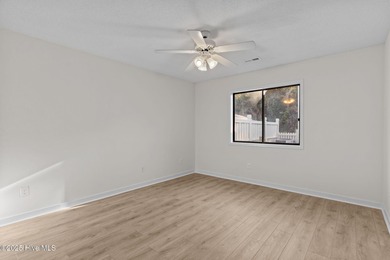 Welcome home 6128 Inland Greens Drive in nestled in the amenity on Inland Greens Golf Course in North Carolina - for sale on GolfHomes.com, golf home, golf lot