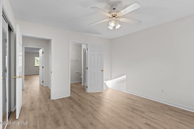 Welcome home 6128 Inland Greens Drive in nestled in the amenity on Inland Greens Golf Course in North Carolina - for sale on GolfHomes.com, golf home, golf lot