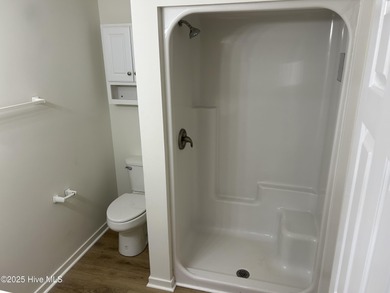 Welcome home 6128 Inland Greens Drive in nestled in the amenity on Inland Greens Golf Course in North Carolina - for sale on GolfHomes.com, golf home, golf lot