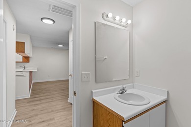 Welcome home 6128 Inland Greens Drive in nestled in the amenity on Inland Greens Golf Course in North Carolina - for sale on GolfHomes.com, golf home, golf lot