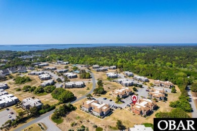 Completely renovated 2-story corner-unit condo in the heart of on Seascape Golf Links in North Carolina - for sale on GolfHomes.com, golf home, golf lot