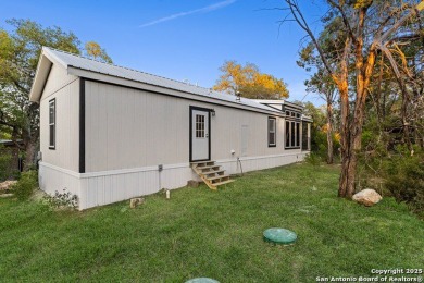 This charming 2-bedroom home in Spring Branch offers peaceful on Rebecca Creek Golf Club in Texas - for sale on GolfHomes.com, golf home, golf lot