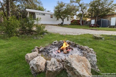 This charming 2-bedroom home in Spring Branch offers peaceful on Rebecca Creek Golf Club in Texas - for sale on GolfHomes.com, golf home, golf lot