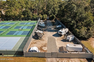 Welcome home 6128 Inland Greens Drive in nestled in the amenity on Inland Greens Golf Course in North Carolina - for sale on GolfHomes.com, golf home, golf lot