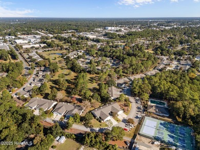 Welcome home 6128 Inland Greens Drive in nestled in the amenity on Inland Greens Golf Course in North Carolina - for sale on GolfHomes.com, golf home, golf lot