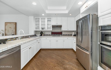 Experience effortless living in this builder's model home on Grayhawk Golf Club  in Arizona - for sale on GolfHomes.com, golf home, golf lot