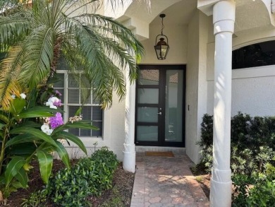 Located in Wellington's prestiges Palm Beach Polo & Country Club on Palm Beach Polo and Country Club in Florida - for sale on GolfHomes.com, golf home, golf lot