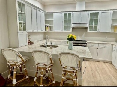 Located in Wellington's prestiges Palm Beach Polo & Country Club on Palm Beach Polo and Country Club in Florida - for sale on GolfHomes.com, golf home, golf lot