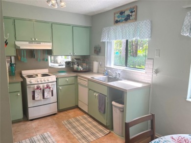 First Floor CONDO- 1BR/1.5 baths located with a view of the on Heather Golf and Country Club in Florida - for sale on GolfHomes.com, golf home, golf lot