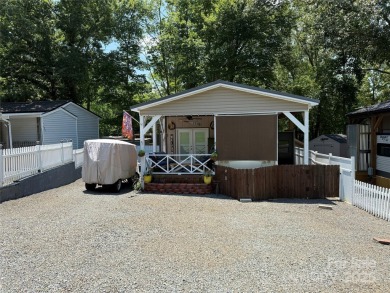 This well appointed unit is ready for the next owners to enjoy on The Tillery Tradition Country Club in North Carolina - for sale on GolfHomes.com, golf home, golf lot