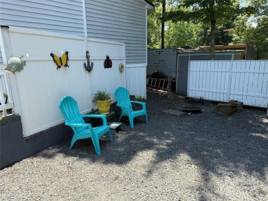 This well appointed unit is ready for the next owners to enjoy on The Tillery Tradition Country Club in North Carolina - for sale on GolfHomes.com, golf home, golf lot