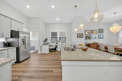 Move-in ready and meticulously maintained, this beautiful home on Cape Fear National At Brunswick Forest in North Carolina - for sale on GolfHomes.com, golf home, golf lot