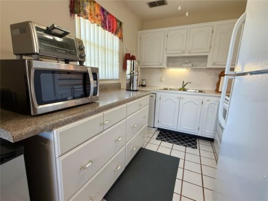 Enjoy resort style living at Pointe West in Summertree. This on Summertree Golf Course in Florida - for sale on GolfHomes.com, golf home, golf lot
