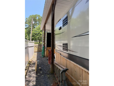 This well appointed unit is ready for the next owners to enjoy on The Tillery Tradition Country Club in North Carolina - for sale on GolfHomes.com, golf home, golf lot