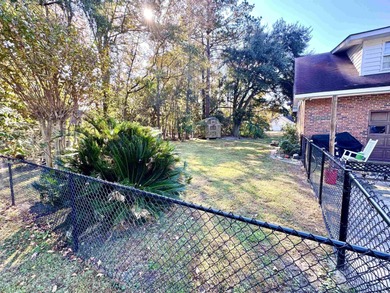 Looking for a gorgeous family home in a highly desirable on Wedgefield Plantation Golf Club in South Carolina - for sale on GolfHomes.com, golf home, golf lot