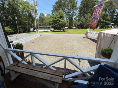 This well appointed unit is ready for the next owners to enjoy on The Tillery Tradition Country Club in North Carolina - for sale on GolfHomes.com, golf home, golf lot