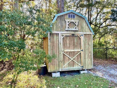 Looking for a gorgeous family home in a highly desirable on Wedgefield Plantation Golf Club in South Carolina - for sale on GolfHomes.com, golf home, golf lot