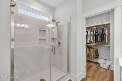 Move-in ready and meticulously maintained, this beautiful home on Cape Fear National At Brunswick Forest in North Carolina - for sale on GolfHomes.com, golf home, golf lot