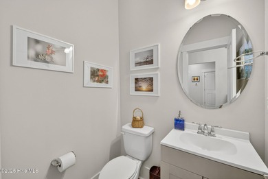 Move-in ready and meticulously maintained, this beautiful home on Cape Fear National At Brunswick Forest in North Carolina - for sale on GolfHomes.com, golf home, golf lot