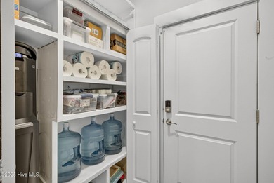 Move-in ready and meticulously maintained, this beautiful home on Cape Fear National At Brunswick Forest in North Carolina - for sale on GolfHomes.com, golf home, golf lot