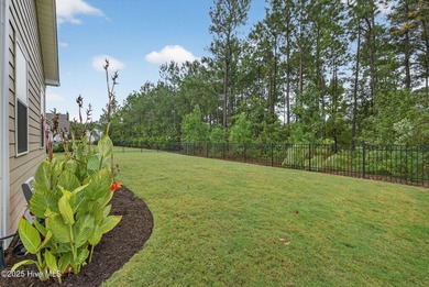 Move-in ready and meticulously maintained, this beautiful home on Cape Fear National At Brunswick Forest in North Carolina - for sale on GolfHomes.com, golf home, golf lot