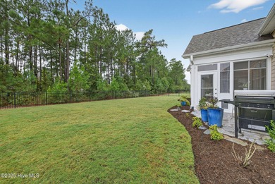 Move-in ready and meticulously maintained, this beautiful home on Cape Fear National At Brunswick Forest in North Carolina - for sale on GolfHomes.com, golf home, golf lot