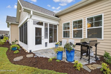 Move-in ready and meticulously maintained, this beautiful home on Cape Fear National At Brunswick Forest in North Carolina - for sale on GolfHomes.com, golf home, golf lot