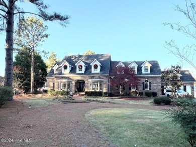 Enjoy lake front living in this luxury home in beautiful on Deercroft Golf and Country Club in North Carolina - for sale on GolfHomes.com, golf home, golf lot