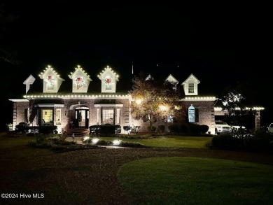 Enjoy lake front living in this luxury home in beautiful on Deercroft Golf and Country Club in North Carolina - for sale on GolfHomes.com, golf home, golf lot