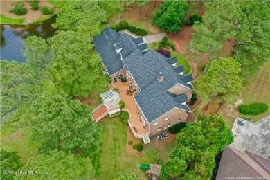 Enjoy lake front living in this luxury home in beautiful on Deercroft Golf and Country Club in North Carolina - for sale on GolfHomes.com, golf home, golf lot