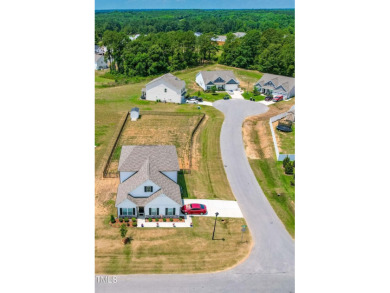 Are you looking for a newer construction home on almost half an on Reedy Creek Golf Course in North Carolina - for sale on GolfHomes.com, golf home, golf lot