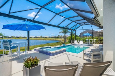 Timeless 2022-built pool home that overlooks the tranquil lake on Bent Pine Golf Club in Florida - for sale on GolfHomes.com, golf home, golf lot