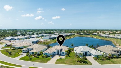 Timeless 2022-built pool home that overlooks the tranquil lake on Bent Pine Golf Club in Florida - for sale on GolfHomes.com, golf home, golf lot