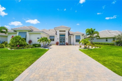 Timeless 2022-built pool home that overlooks the tranquil lake on Bent Pine Golf Club in Florida - for sale on GolfHomes.com, golf home, golf lot